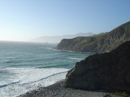 beach along pacific coast highway, in the big sur mountains